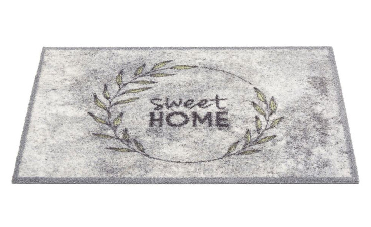 Fußmatte Miabella 50x70cm von Astra aus Polyamid, grau, mit grünem Blattkranz und "sweet HOME"-Schriftzug.