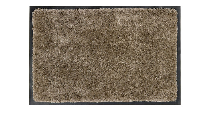 Die Astra Fußmatte Lava 60 x 80 cm ist eine rechteckige beigefarbene Polyester-Fußmatte mit zotteliger Struktur und schwarzem Rand.