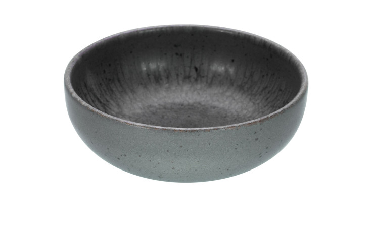 Abgebildet ist eine runde, leere Creatable Dipschale Uno 12 cm mit gesprenkelter Textur auf weißem Hintergrund.