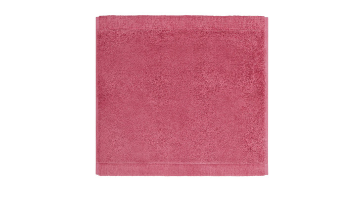 Ein fein säuberlich gefalteter rosa Cawö Seiflappen Lifestyle 30 x 30 cm auf weißem Hintergrund.