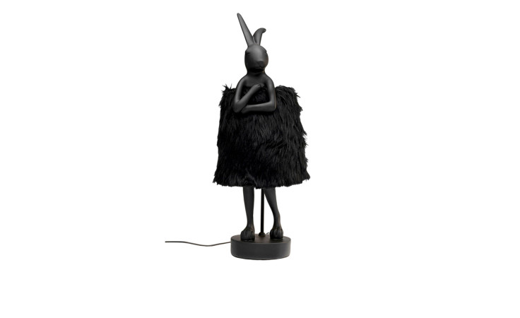 Die Kare Tischleuchte Rabbit ist eine schwarze Lampe in Hasenform mit Webpelz-Schirm, Sockel aus Polyresin und sichtbarer Schnur.