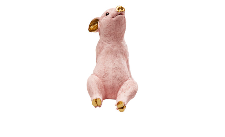 Das Kare Spardose Chillax Pig ist eine rosa Figur mit goldenen Akzenten, die aufrecht auf einem weißen Hintergrund sitzt.