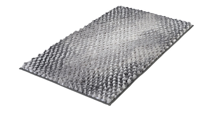 Der Badteppich Cory 60 x 100 cm von Kleine Wolke zeigt einen strukturierten Farbverlauf auf weißem Hintergrund.