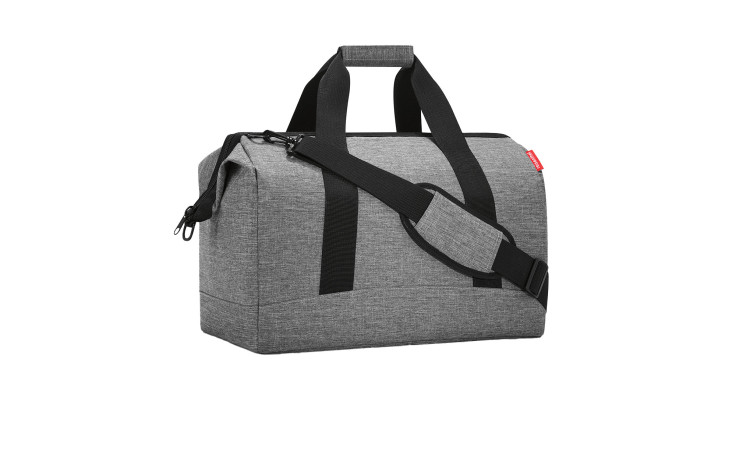 Reisenthel Reisetasche Allrounder L in Grey Twist mit schwarzen Griffen, abnehmbarem Gurt und strapazierfähigem Polyestergewebe.