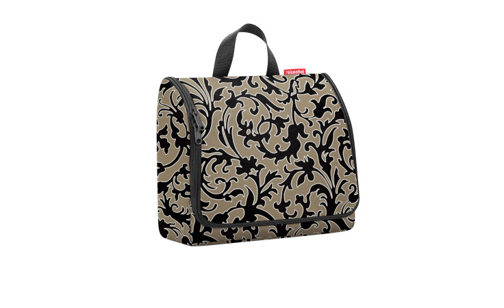 Die Reisenthel Kulturtasche Toiletbag XL ist eine beige Braun Weiß Schwarz Kulturtasche mit Henkel, hergestellt aus recyceltem Polyester.