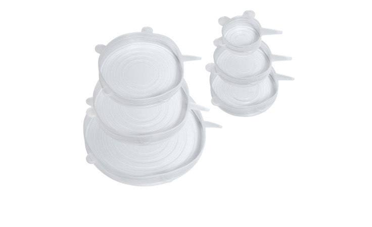 Sechs Küchenprofi Frischhaltedeckel Stretch, 27 cm und kleiner, fein säuberlich gestapelt auf weißem Grund.