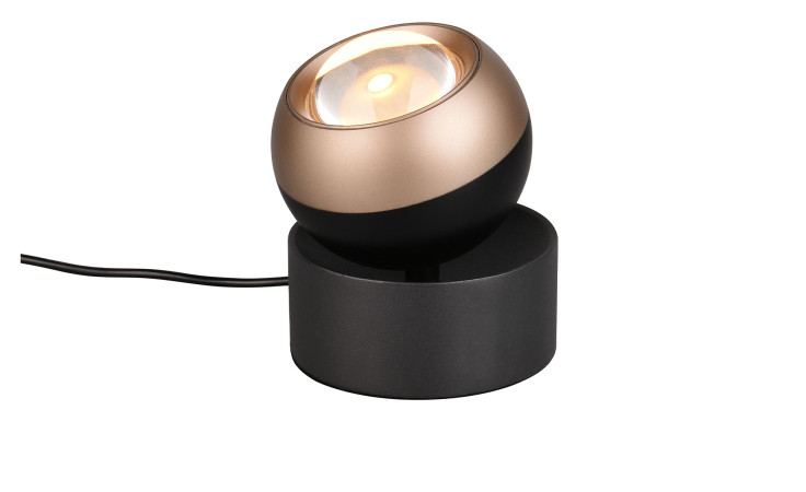 Die Trio LED-Tischleuchte Orbit 10 cm ist eine moderne, kugelförmige Tischleuchte aus gold-schwarzem Metall mit offenem Kabel.