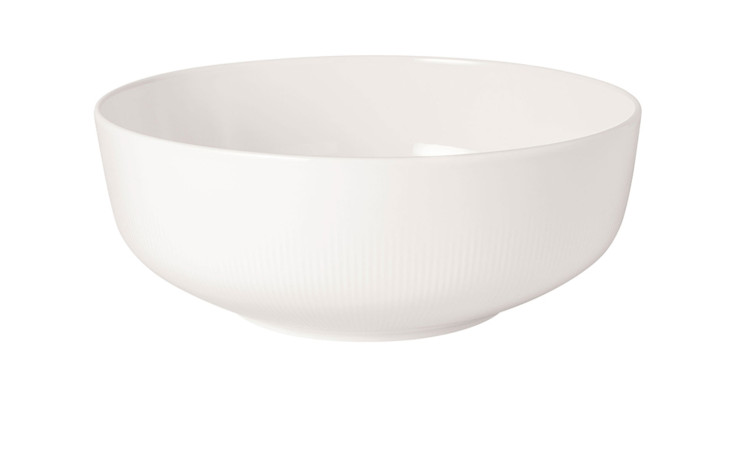 Die Schüssel Afina 26,5 cm ist eine schlichte weiße Bone China Schale mit glatter Oberfläche, die auf weißem Grund abgebildet ist.