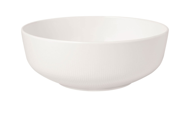Die Schüssel Afina 24 cm ist eine glatte, schlichte weiße Bone China Schale auf weißem Grund.