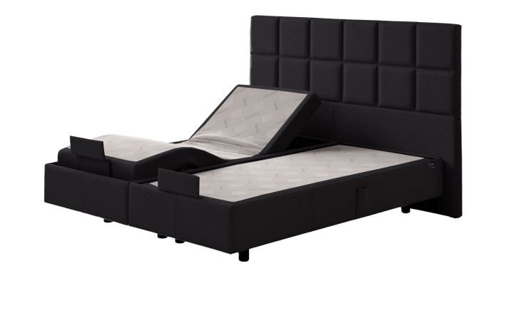 Boxspringbett Discovery Classic in einem Bezug in Charcoal in Stoff. Schräge Seitenansicht