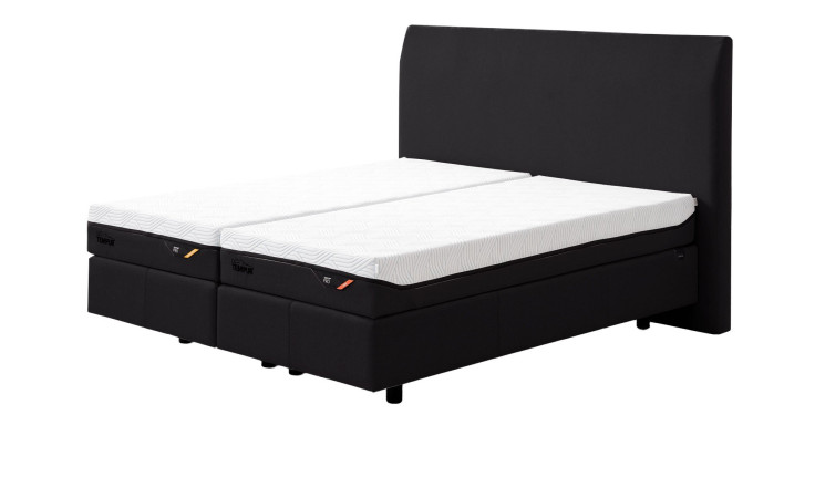 Boxspringbett Discovery Classic in einem Bezug in Charcoal in Stoff. Schräge Seitenansicht