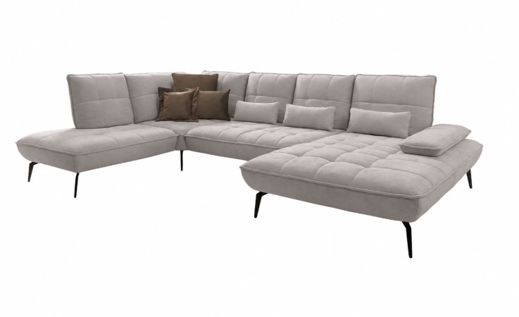 Hellgraues Vito Ticona Plus-Sofa mit getufteter Sitzfläche, dunkelbraunen Kissen und schlanken schwarzen Beinen.