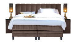 Komfort-Boxspringbett Premium Chandon Elektro in einem braunen Bezug