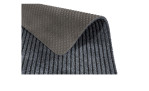 Nahaufnahme der Astra Fußmatte Rib Line Sprint 50 x 80 cm, grau gerippte Polyestermatte mit gepunkteter Gummirückseite, umgeschlagen.