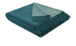 Ein gefaltetes, zweifarbiges teal und hellgraues Plaid Cashmere 130 x 170 cm mit Fransen, eine Ecke umgeschlagen.