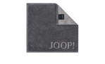 EIN JOOP! Seiftuch Classic 30x30 cm von Joop in Anthrazit, mit einer umgeknickten Ecke, die eine helle Unterseite und ein schwarzes Etikett zeigt.