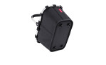 Der Reisenthel Einkaufskorb Carrybag XS ist ein schwarzer Korb aus recyceltem Polyester mit einem Aluminiumgriff und 4 Füßen.