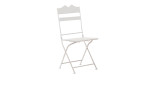 Der Boltze Stuhl Justus ist ein weißer Metall-Klappstuhl mit einer dekorativen Rückenlehne, toll mit einem weißen Regal.