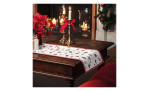 Gobelin Läufer Toy's Delight 32 x 96 cm in weiß mit rotem Ran und weihnachtlichen Motiven auf einem Tisch.