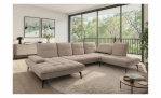 Modernes Wohnzimmer mit der Vito Komfort-Wohnlandschaft Ticona Plus, Sitzhöhenverstellung, rundem Teppich und Blick in den Garten.
