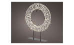 Der LED-Kranz mit Ständer 51 cm ist ein silberfarbener Kreiskranz mit Leuchtmittel inklusive auf einem Metallständer.