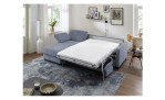 Komfort-Schlafsofa Mailand, in der Farbausführung Graublau, in einem Raum stehend, mit der Schlaffunktion