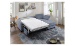 Komfort-Schlafsofa Mailand, in der Farbausführung Graublau, in einem Raum stehend, mit der Schlaffunktion