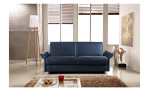 Komfort-Schlafsofa Mailand, in der Farbausführung Navy, in einem Raum stehend,mit der Armlehnfunktion