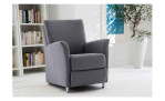 Sessel LASCONDO 9250, Bezug Stoff Orlando, Farbe Dark-grey, Bücherregal und Pflanze im Hintergrund