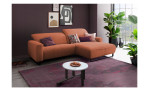 Komfort-Wohnlandschaft Lascondo Elwa, in der Farbausführung Orange, in einem Raum stehend