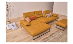 Komfort-Ecksofa 9360, in der Farbausführung Sun, in einem Raum stehend mit der Sitzrückenverstellung