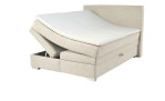 Boxspringbett Alice in der Farbe Beige mit geöffnetem Bettkasten links