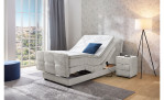 Boxspringbett Pia in der Farbe Hellgrau in einem Zimmer elektrisch verstellt