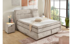 Boxspringbett Quinto Mix in der Farbe Beige in einem Zimmer