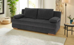 Schlafsofa Cher in der Farbe Dunkelgrau in einemZimmer