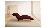 Basis-Liege Jill, in der Farbausführung Chilli, Seitenansicht, in einem Raum stehend, mit der Kopfteilverstellung