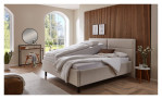 Komfort-Polsterbett Livorno in einem Bezugsstoff in Beige. Mit gezeigter Anstell-Position