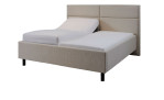 Komfort-Polsterbett Livorno in einem Bezugsstoff in Beige. Mit gezeigter Zero-Gravity-Position.
