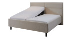 Komfort-Polsterbett Livorno in einem Bezugsstoff in Beige. Mit gezeigter Anstell-Position.