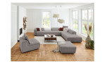 Komfort-Ecksofa plano|FORM Toronto, in der Farbausführung Grey, in einem Raum stehend mit einem Hocker und einem Sessel