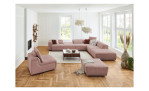 Komfort-Ecksofa plano|FORM Toronto, in der Farbausführung Rose, in einem Raum stehend mit einem Hocker und einem Sessel