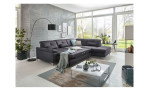 Komfort-Ecksofa plano|FORM Marbella, in der Farbausführung Grau, in einem Raum stehend mit der Schlaffunktion