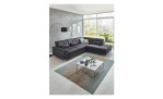 Komfort-Ecksofa plano|FORM Marbella, in der Farbausführung Grau, in einem Raum stehend