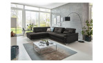 Basis-Ecksofa plano|FORM Marbella, in der Farbausführung Anthrazit, in einem Raum stehend mit der Sitztiefenverstellung