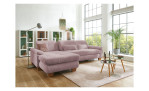 Komfort-Wohnlandschaft plano|FORM Marbella, in der Farbausführung Rose , in einem Raum stehend, mit der Sitztievenverstellung und Kissen