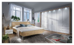 Komfort-Falttürenschrank Rügen in Glas Weiß im Zimmer
