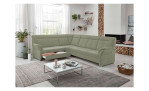 Komfort-Ecksofa plano|FORM Favorit, in der Farbausführung Lind, in einem Raum stehend mit der offenen Schublade