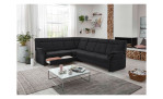 Komfort-Ecksofa plano|FORM Favorit, in der Farbausführung Anthrazit, in einem Raum stehend mit der offenen Schublade