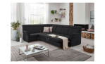 Komfort-Ecksofa plano|FORM Favorit, in der Farbausführung Anthrazit, in einem Raum stehend mit der Bettfunktion