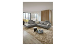 Komfort-Ecksofa plano|FORM Formello, in der Farbausführung Grau, in einem Raum stehend